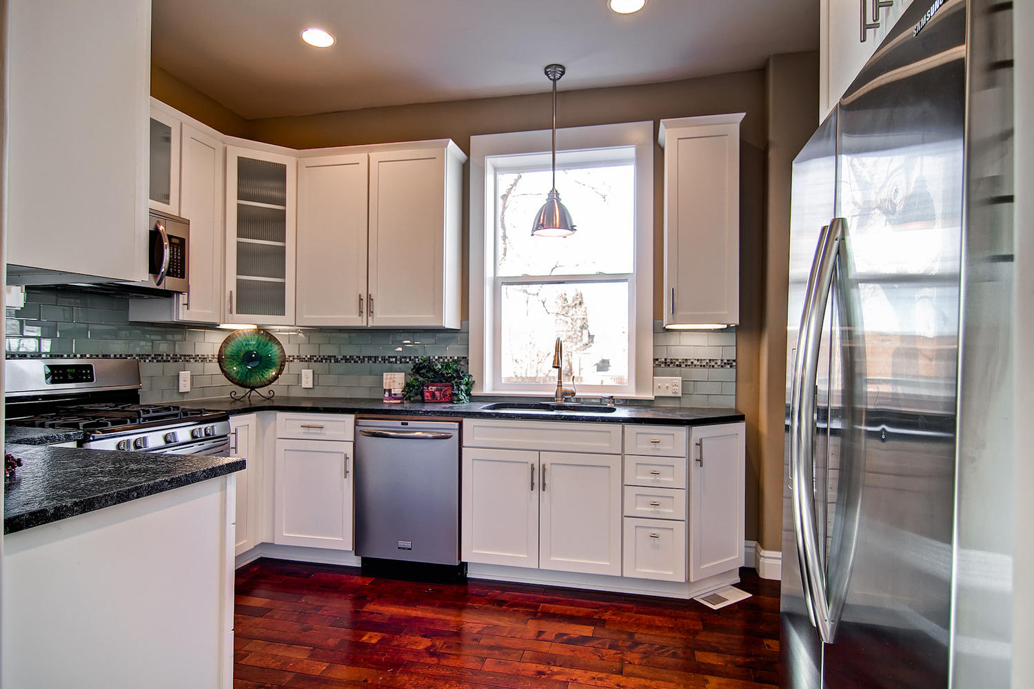 Interior Kitchen residential townhouse multi-family Real estate Projects - Weins Development Group - Award-winning real estate developers in Denver, Colorado. Top #1 of Builders producing high-quality townhomes, condos, apartments, retail, & office projects